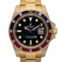 black and stick dot dial of the Rolex GMT-Master II Haribo Gold Replica