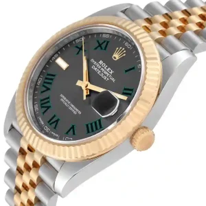 Yellow gold bezel of the watch