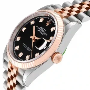 Rose gold bezel of the watch