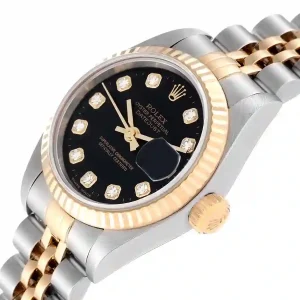 Yellow gold bezel of the watch