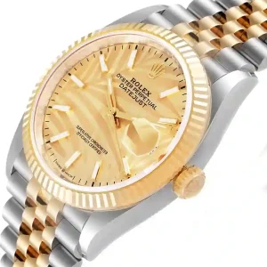 Yellow gold bezel of the watch