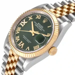 Yellow gold bezel of the watch