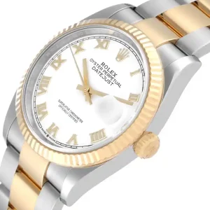 Yellow gold bezel of the watch