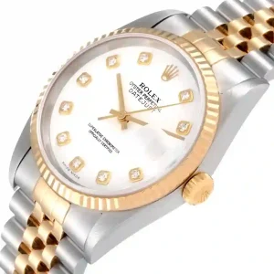 Yellow gold bezel of the watch