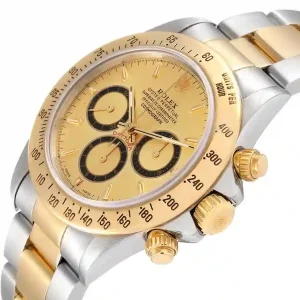 yellow gold bezel of the watch