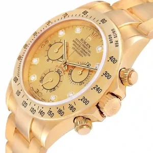 yellow gold bezel of the watch