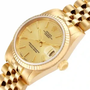 Yellow gold bezel of the watch